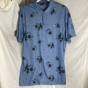 Men’s Travis Mathew Polo shirt. Blue with flower pattern Large